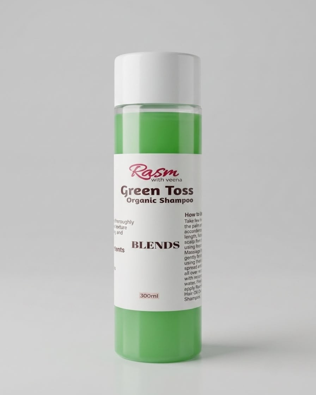 House of MKB Green Toss Organic Shampoo in a premium translucent bottle featuring a vibrant natural green color with rich organic herbs spread along the base.