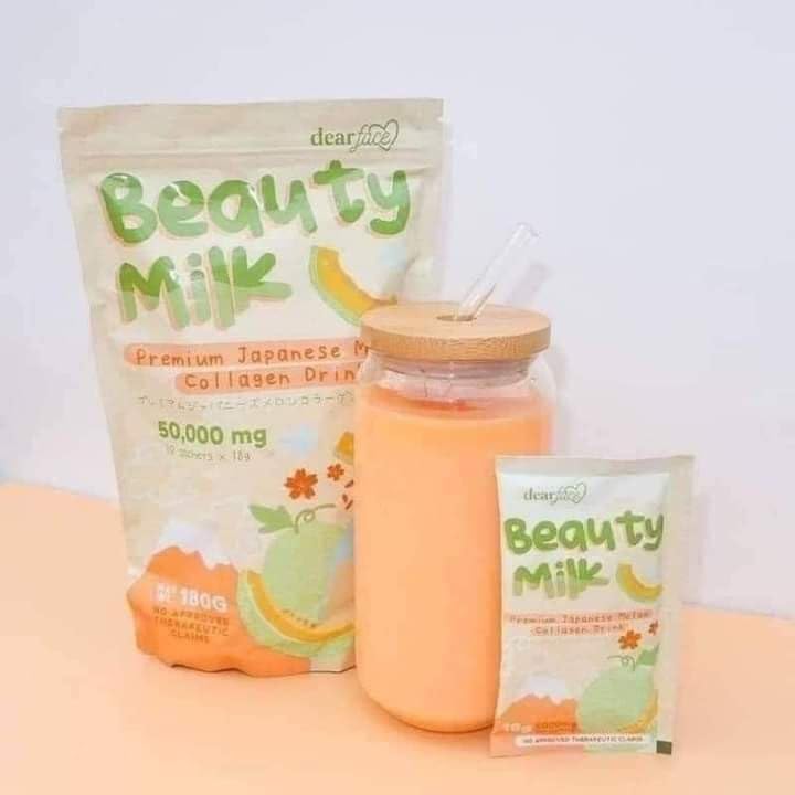 Dear Face Beauty Milk Premium Japanese Melon Collagen Drink main pouch pack with a prepared drink glass and an individual 10g sachet.