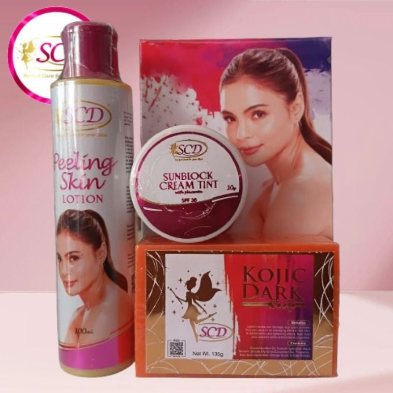 Close-up of the 3-piece SCD Peeling Set items showing the Kojic Dark Soap, Peeling Lotion, and Sunblock Cream.