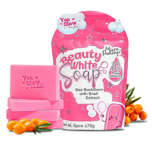 You Glow Babe Beauty White Soap 5-piece pouch package alongside a stack of pink soap bars and fresh orange sea buckthorn berries.